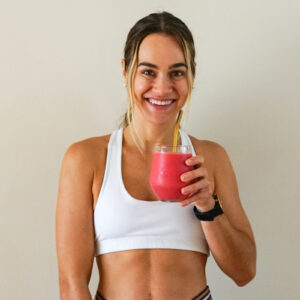 How an athlete should eat - Picture of Luana Marchi holding a glass of juice