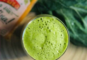 Green juice - a image from the top view of a glass full of green juice from tropical brazil frozen pulp