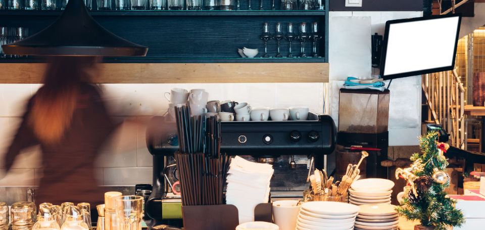 Could Açaí help your business to grow? Image of a woman preparing some food in a café