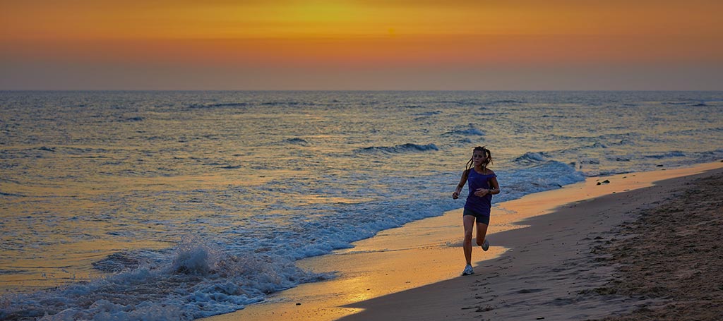 woman running beach