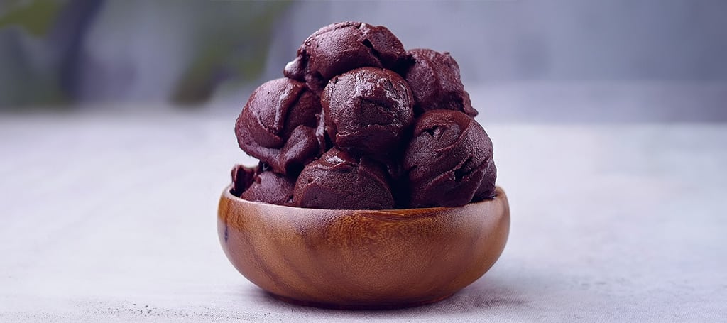 A wooden bowl with acai cream