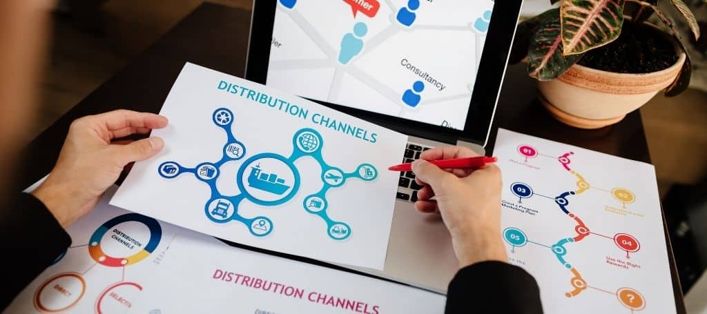 Man analyzing papers with distribution channels