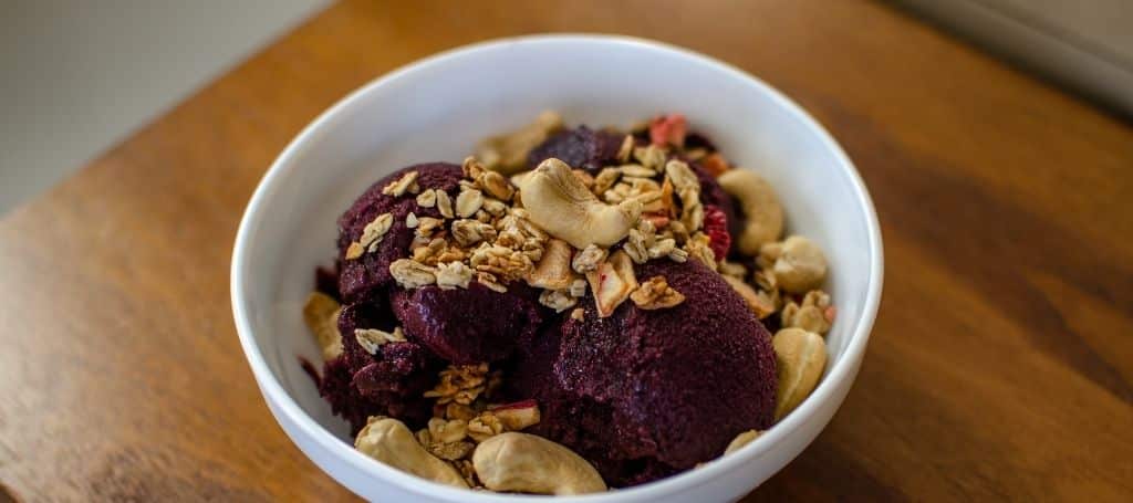 Açaí bowl with cashew nuts and granola