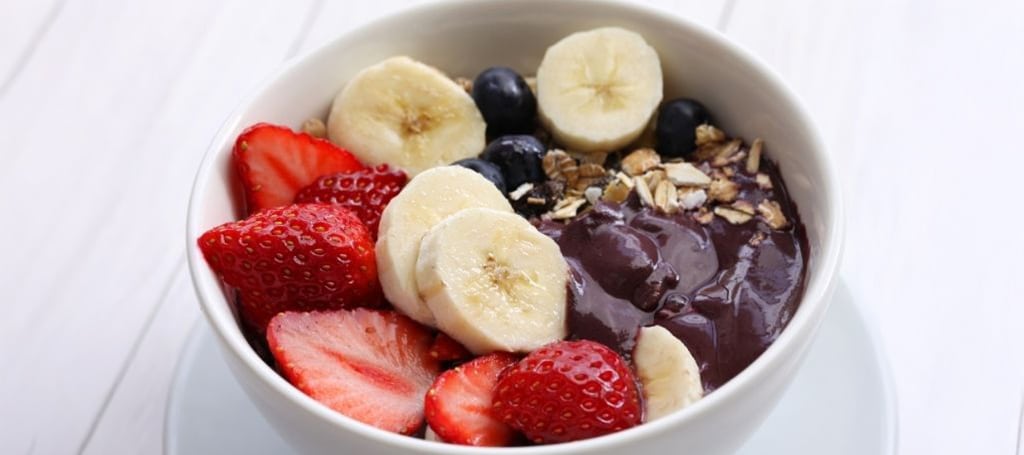 Close Up açaí bowl with strawberry, banana and granola